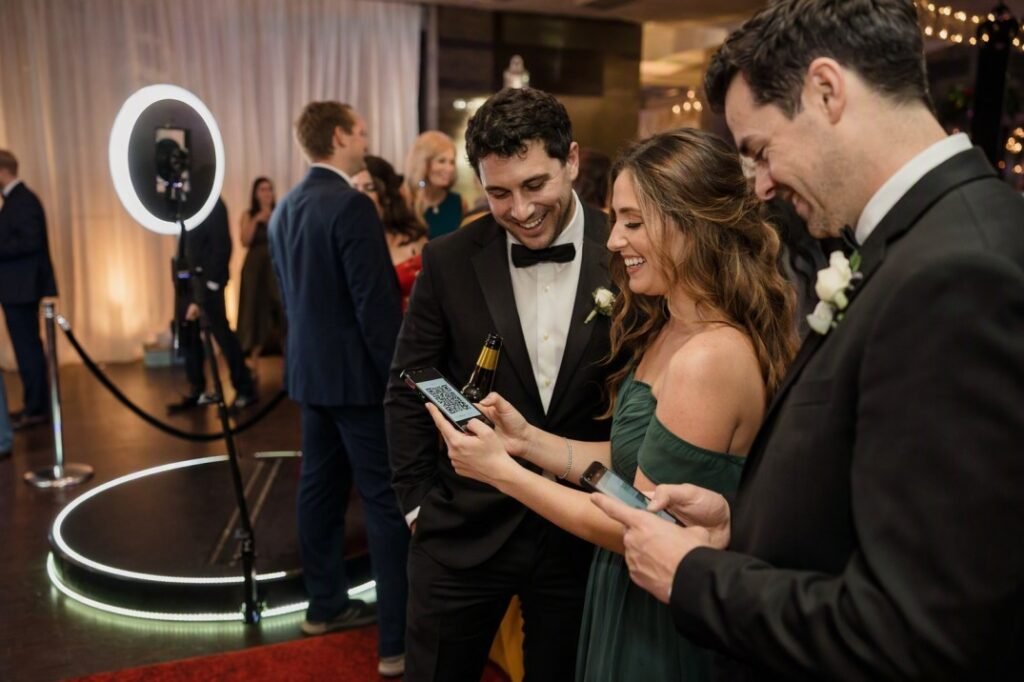 Wedding guests scanning a QR code to receive 360 photo booth videos